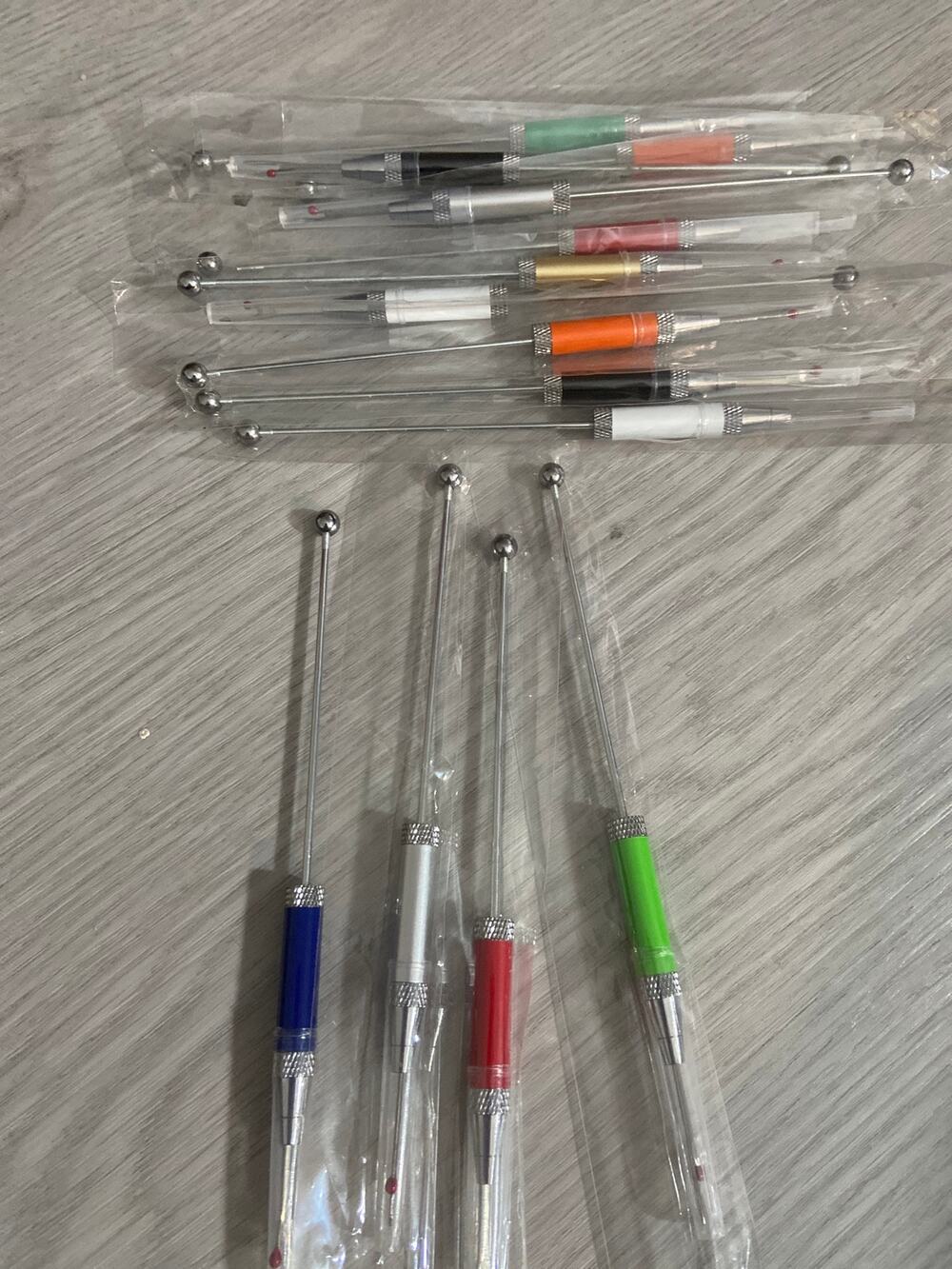 Four piece beadable seam rippers assorted colors